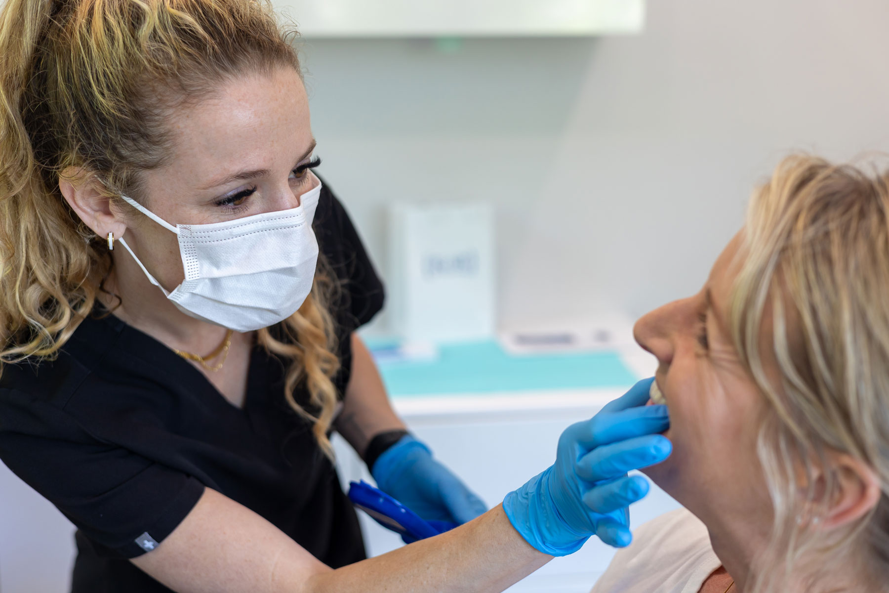 female dentist with a patient